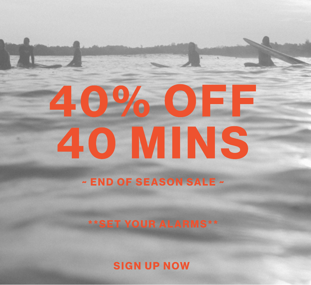 A promotional graphic for Salt Gypsy featuring a black and white photograph of surfers in the ocean with bold orange text reading '40% OFF 40 MINS', smaller text 'END OF SEASON SALE', 'GET YOUR GEAR*', and 'SIGN UP NOW'.